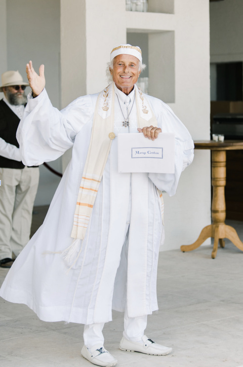 a man hooding a card