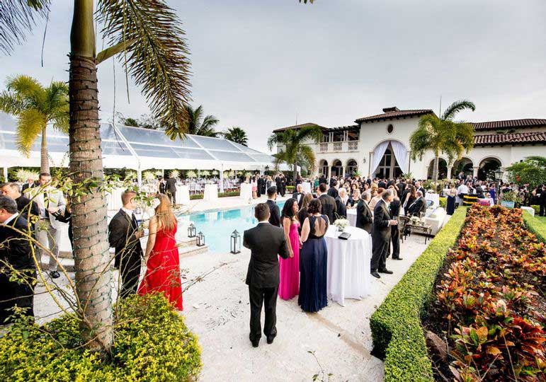 people partying near the pool